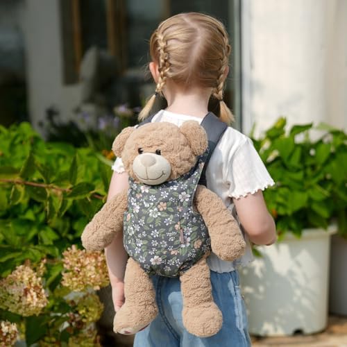 Child wearing gray leaf gagaku toy doll carrier