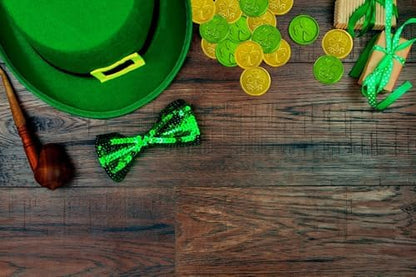 The Dreidel Company festival coins being placed into a themed pot of gold for classroom scavenger hunts.
