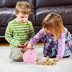 GADIEDIE toddler money box being held by small hands to demonstrate its lightweight design