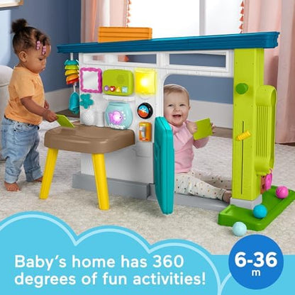 Fisher-Price crawl-around activity center with shape sorter trellis and bright flowers