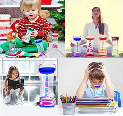 Four colorful liquid bubblers arranged for display