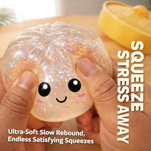 Slow rise sensory toy being squeezed in a hand to demonstrate durability.