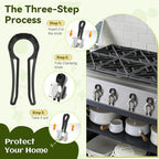 Close up of black gas stove knob safety cover for pets
