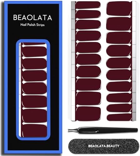 Close up view of the twenty pieces of glossy deep red gel nail sticker wraps in various sizes
