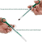 Interchangeable liquid feeding tip attached to the pet pill dispenser