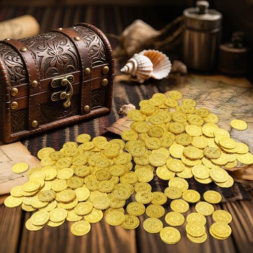 Premium gold-colored plastic reward tokens scattered as adventure themed event supplies and table confetti