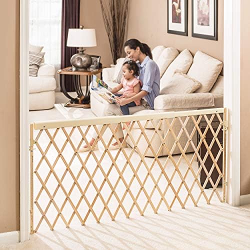 Close up of the telescoping safety rail on the Evenflo expansion baby gate