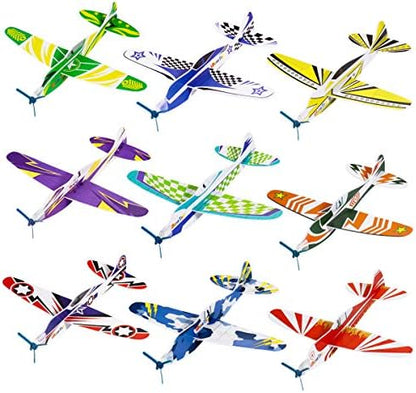 Assorted eight inch foam airplane toys arranged to display the nine unique pattern variants.