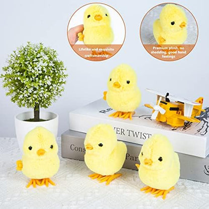 A toddler safely holding the compact and lightweight 3 Otters mechanical wind up chicken toy in hand