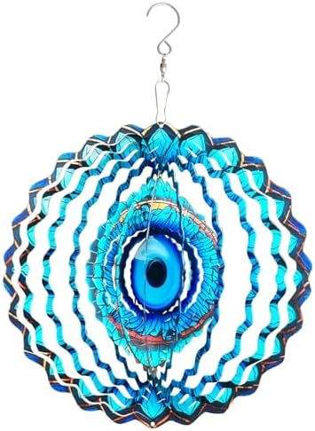 Stainless steel mandala wind spinner hanging in a garden