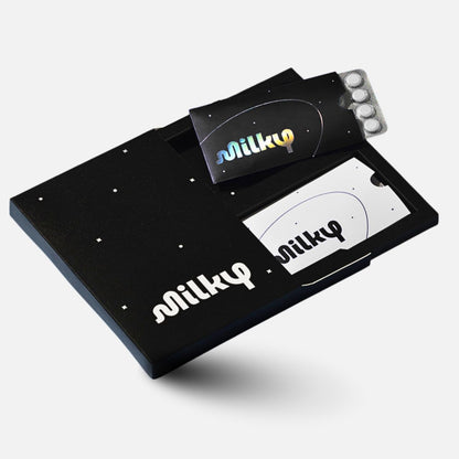Milky Lactose Intolerance Pills Cosmic Black front view of premium dairy relief packaging
