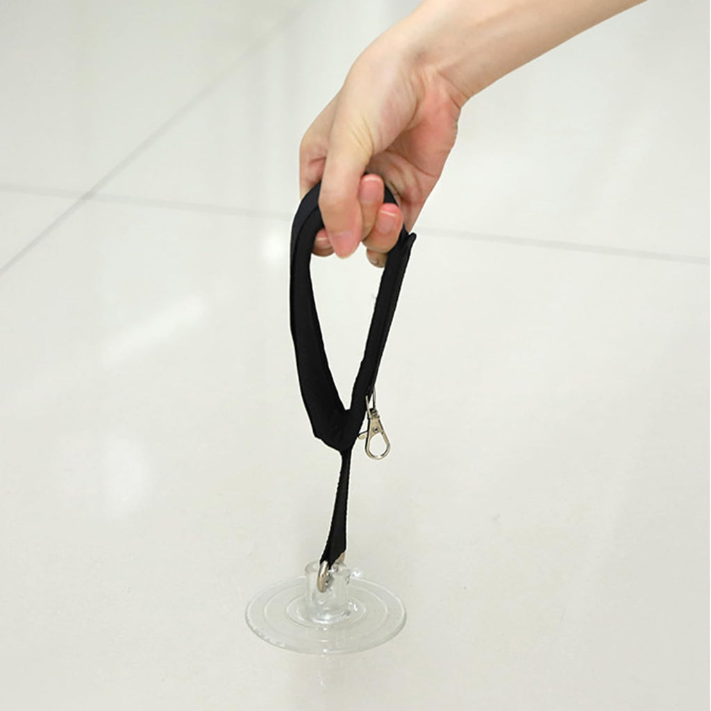 Black pet bathing tether for small dogs and cats in a tub