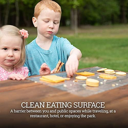 Close up view of the four temporary adhesive strips on the corners of the clear placemat