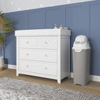 Foundations nursery diaper disposal showing weighted chute mechanism