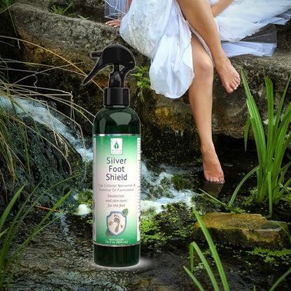True colloidal silver foot spray by Silver Botanicals being applied to the sole of a foot.