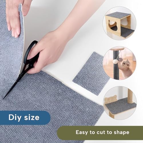 Indoor kitten climbing vertically on a beige adhesive wall scratcher