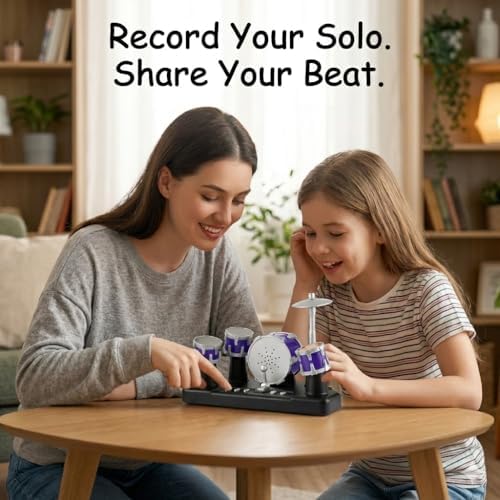 Small desktop musical toy showing bass drum pedal and cymbal buttons