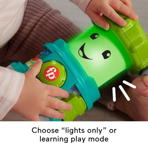 The interactive baby lantern glowing with blue light in a living room setting.