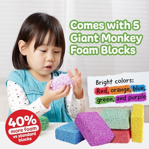 Child hands squishing and molding non toxic bead based monkey foam toy