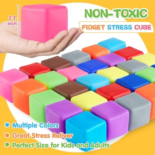 Assorted bright purple orange blue and green sensory squeeze cubes piled next to their clear plastic storage container