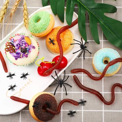 Gejoy artificial plastic earthworms spread out on a table as spooky Halloween party decorations.