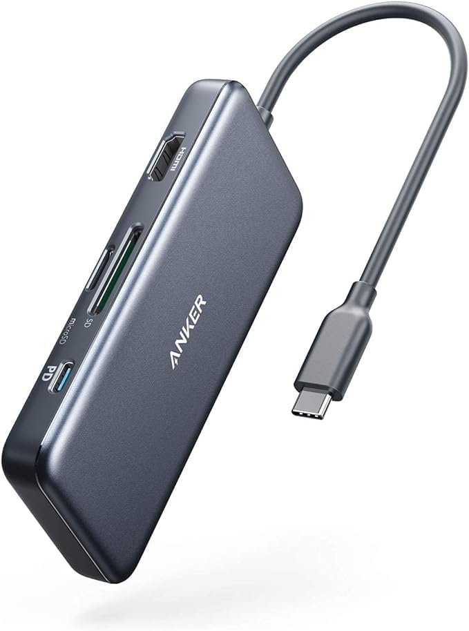 Anker Type C media hub connected to a premium laptop on an office desk.