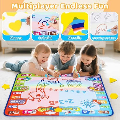 Toddlers using the water doodle mat showing neon drawings appearing on the white canvas area