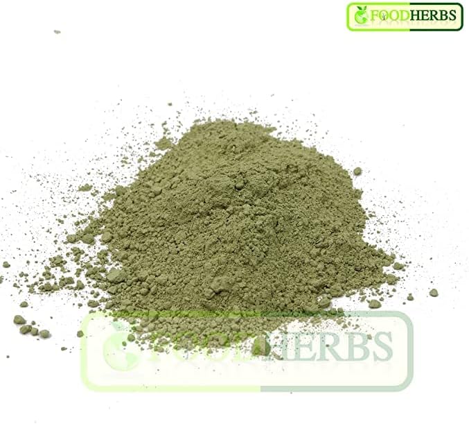 Close up of 100% pure Aegle marmelos herbal powder highlighting its fine green texture for digestive health.