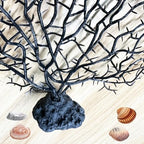 Tfwadmx aquarium landscape decor positioned next to vibrant gravel and swim-through areas.