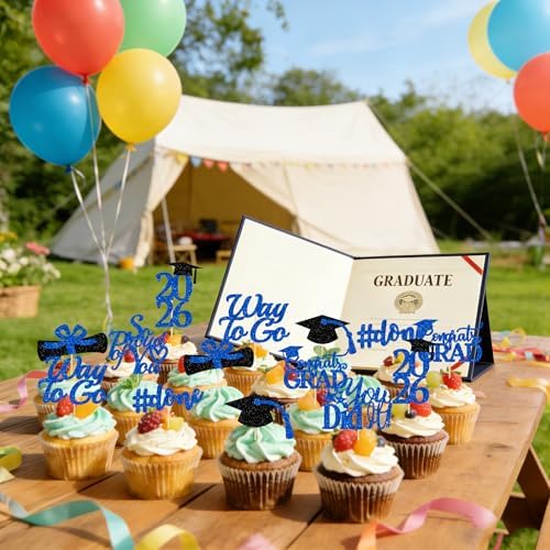 Close up of 2026 graduation diploma cupcake topper