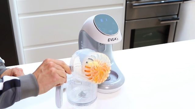 EVLA'S white baby food blender displaying the secure built in safety lock mechanism assembly