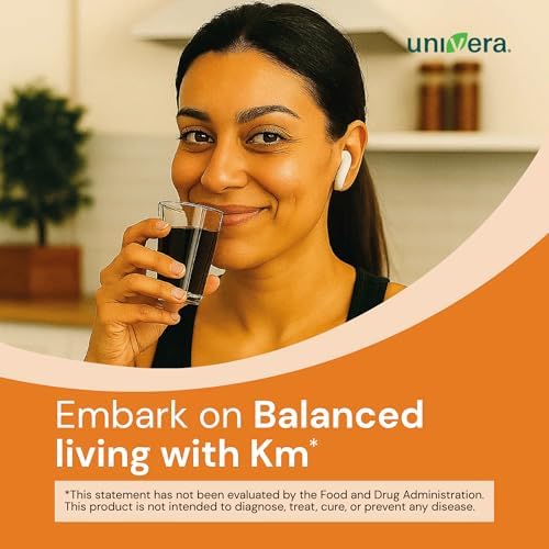 Side perspective of Univera Km mineral drink displaying product authenticity and pure botanical extract blend details.