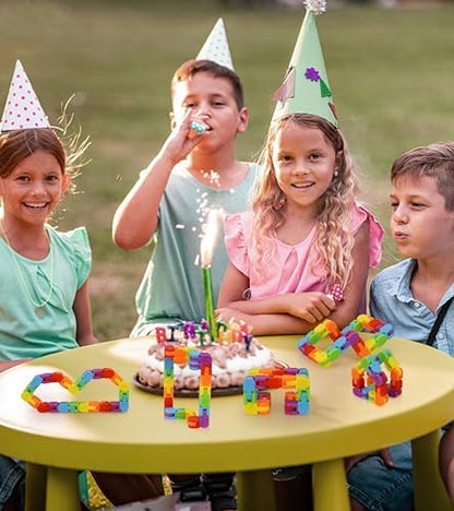Rainbow colored snap and click fidget tracks shaped into letters and numbers for educational play