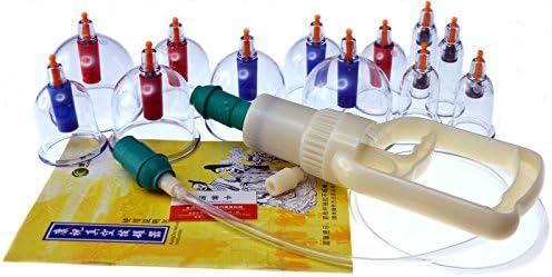 Close up of Kangzhu vacuum pump and various sized transparent plastic cups.