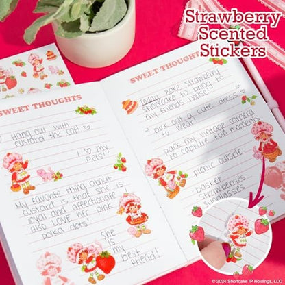 Close up of Strawberry Shortcake journal stationery kit accessories