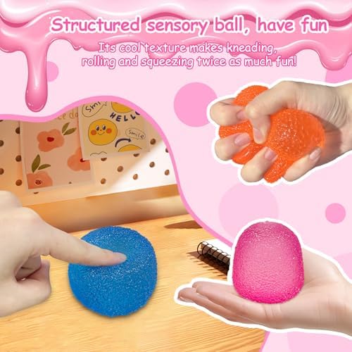 AuraGlaze solid silicone stress ball being squeezed by an adult hand
