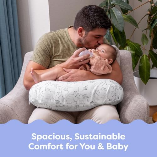 Boppy nursing pillow being used for bottle feeding