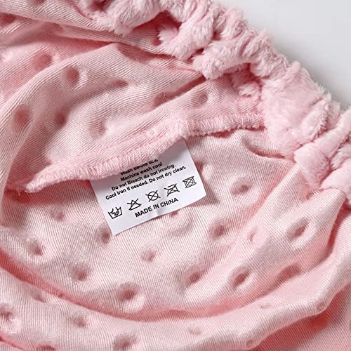 Wipeable polyester baby diaper changing surface being cleaned of nursery powder effortlessly.