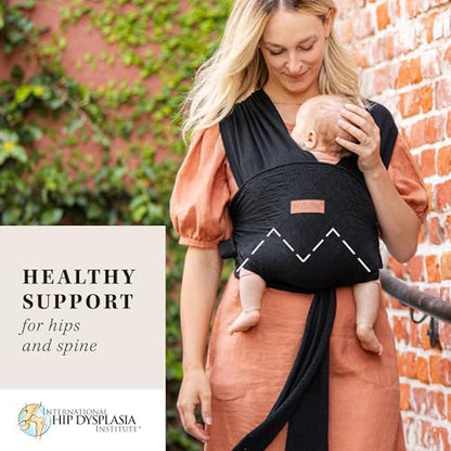 Close up view of the breathable cotton blend fabric on infant sling