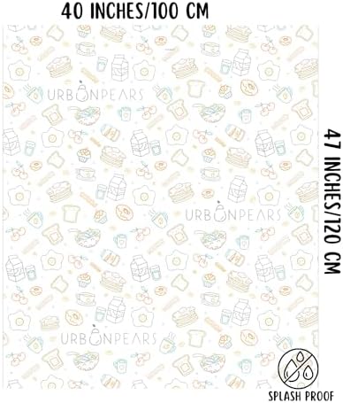 A parent easily rolling up a messy Urban Pears highchair floor mat for quick disposal.