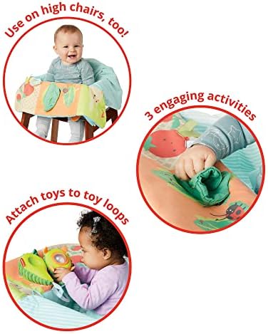 Skip Hop Take Cover Farmstand baby high chair liner showing attached carrot teether toy and crinkle leaves.