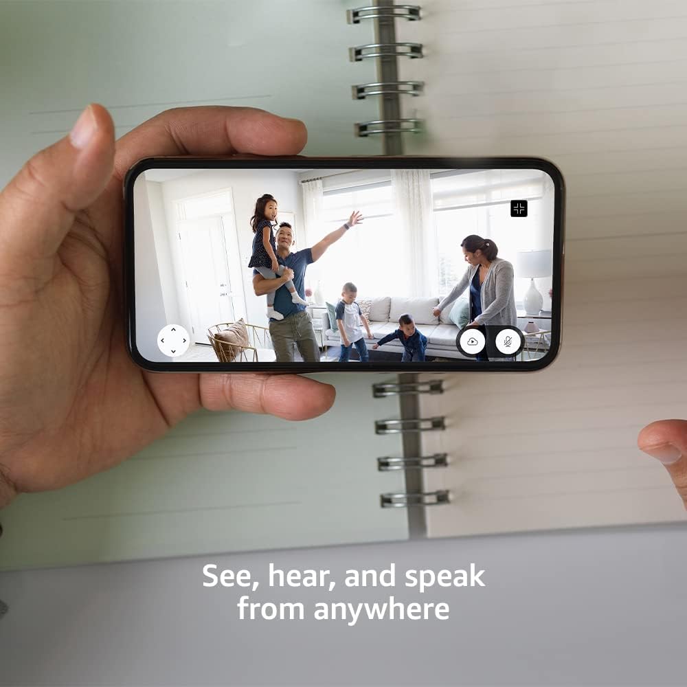Blink smart home surveillance device positioned on a living room shelf