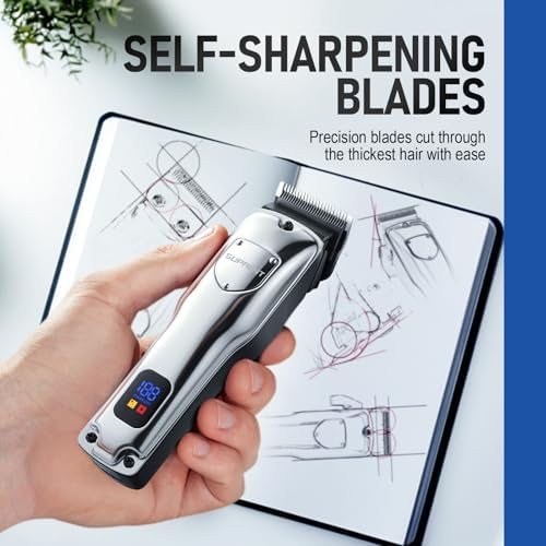 Ergonomic silver grooming clipper being used for a professional fade haircut