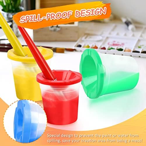 Air-tight plugs being inserted into the RNKP paint cups to keep kids paint fresh.