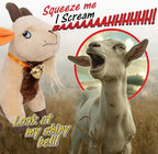 A side view of the authentic Twiddler Toys Screaming Goat novelty gift item sitting upright on an office table.