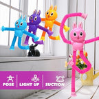Agrasiv bunny pop tubes with suction cup feet stuck firmly onto a glass window pane