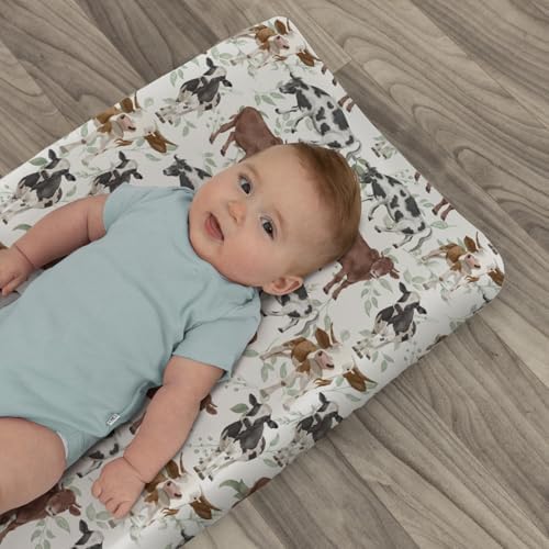 Folded nursery changing sheet displayed with farmhouse decor
