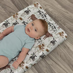 Folded nursery changing sheet displayed with farmhouse decor