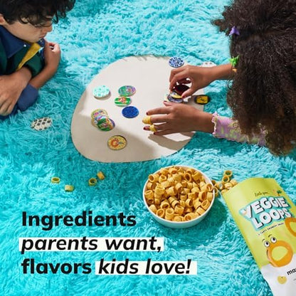 Close up view of the crispy cheese flavored loops showing their hollow ring shape and light texture.