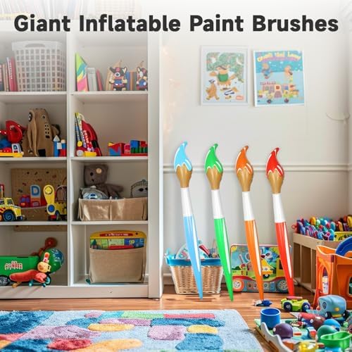 Oversized inflatable art brushes standing next to a doorway as a welcoming back to school display.